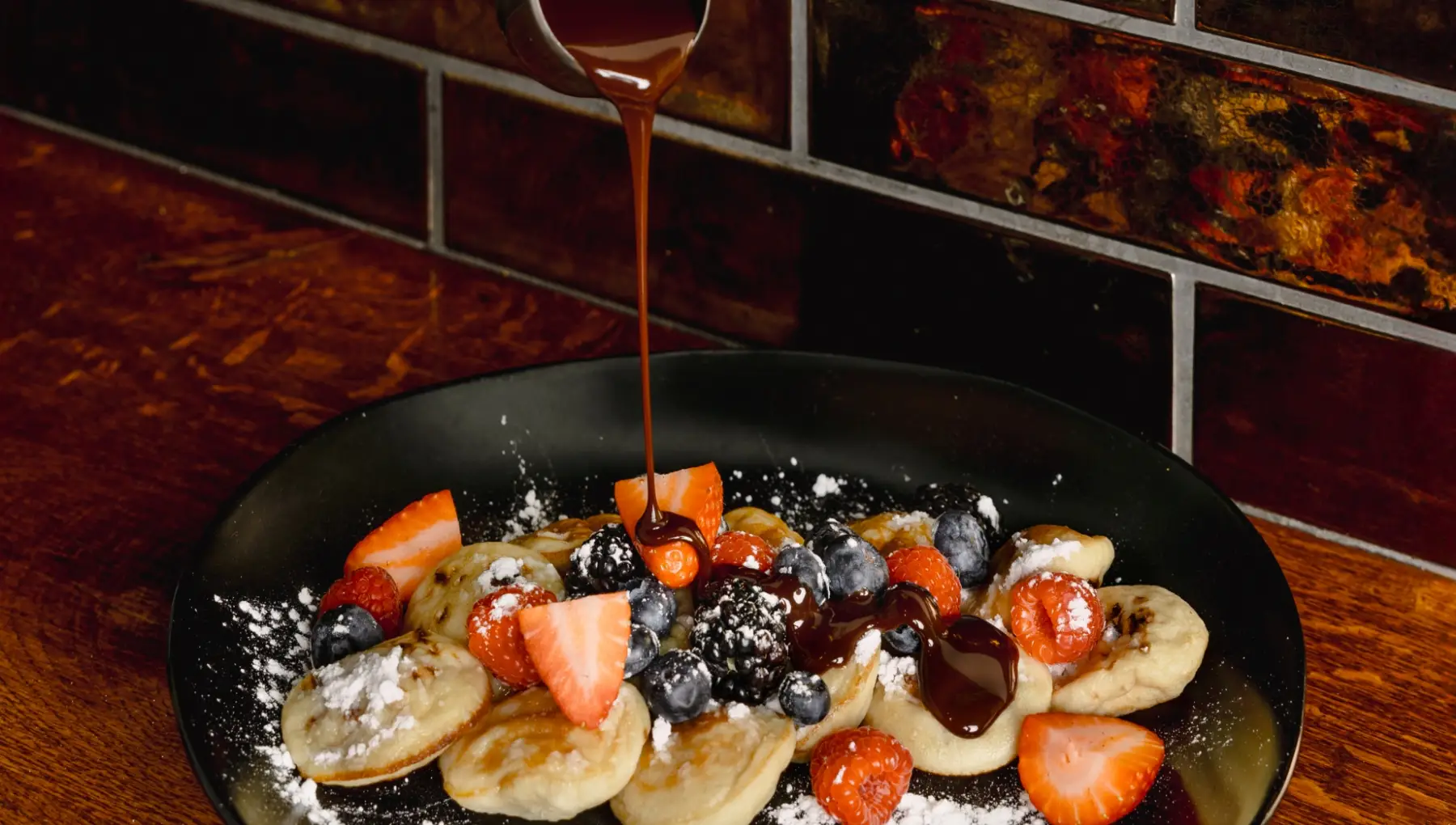 Dutch mini pancakes chocolate sauce