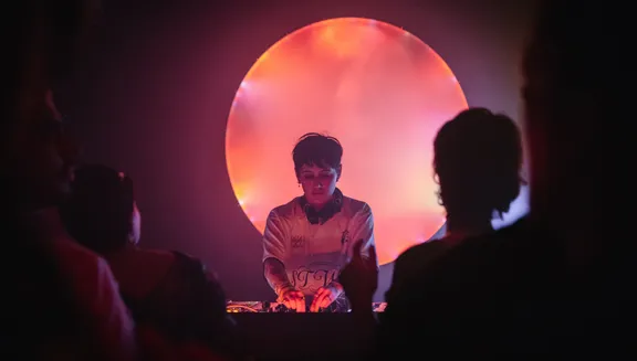 Radio Radio DJ playing music and people dancing