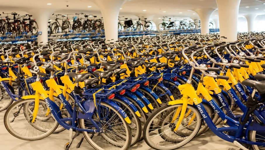 OV-bikes parked in Amsterdam Central Station.
