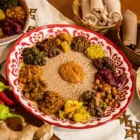 Dishes at Kilimanjaro Take Me Away Ethiopian-Eritrean restaurant in Oost