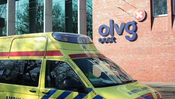 OLVG Oost hospital exterior with ambulance.