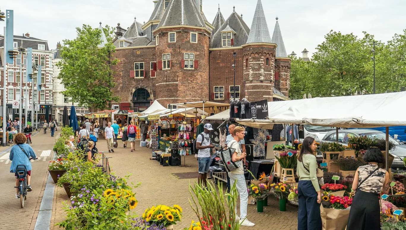 Nieuwmarkt market flower stalls and De Waag