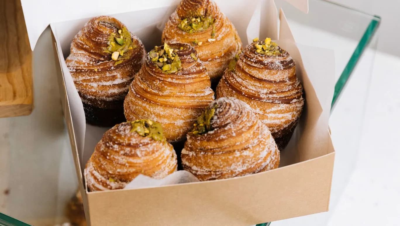 Pastries in a box at SAINT-JEAN bakery.