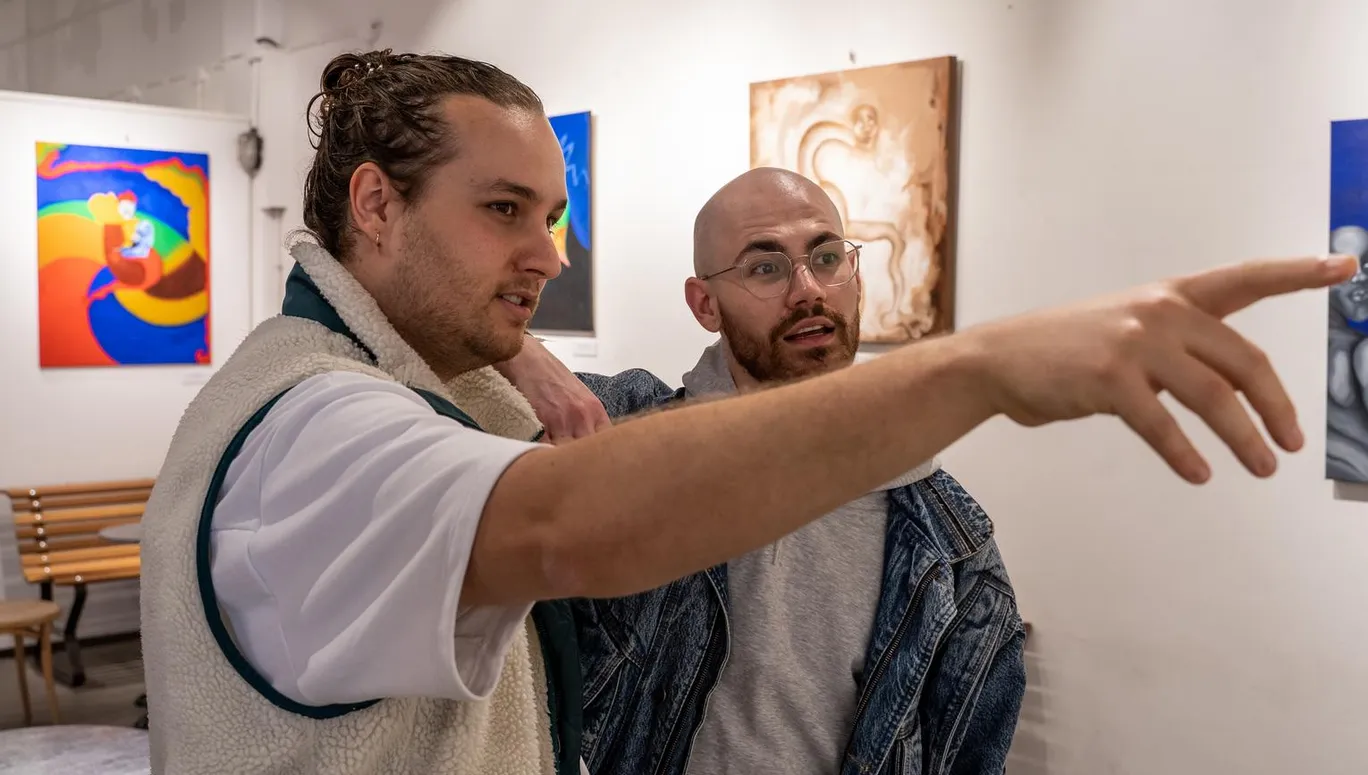 A couple visits OSCAM - Open Space Contemporary Art Museum.