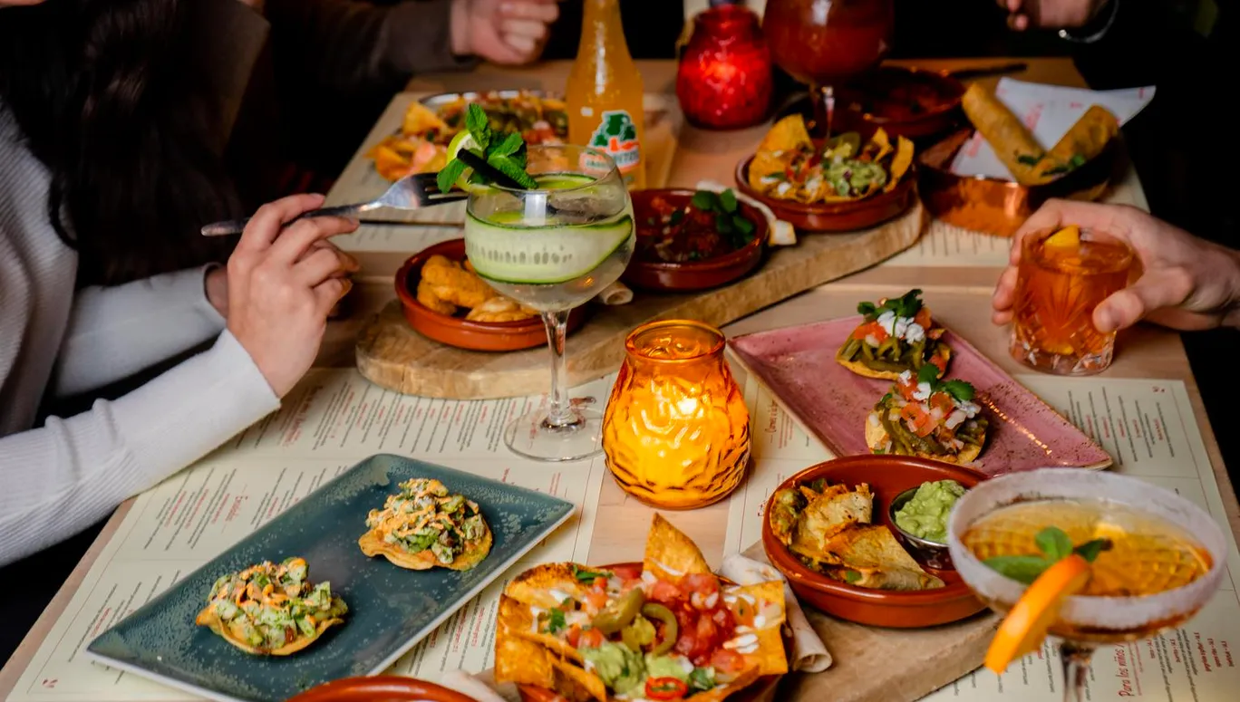 People having dinner in Restaurant Rosita's in Almere.