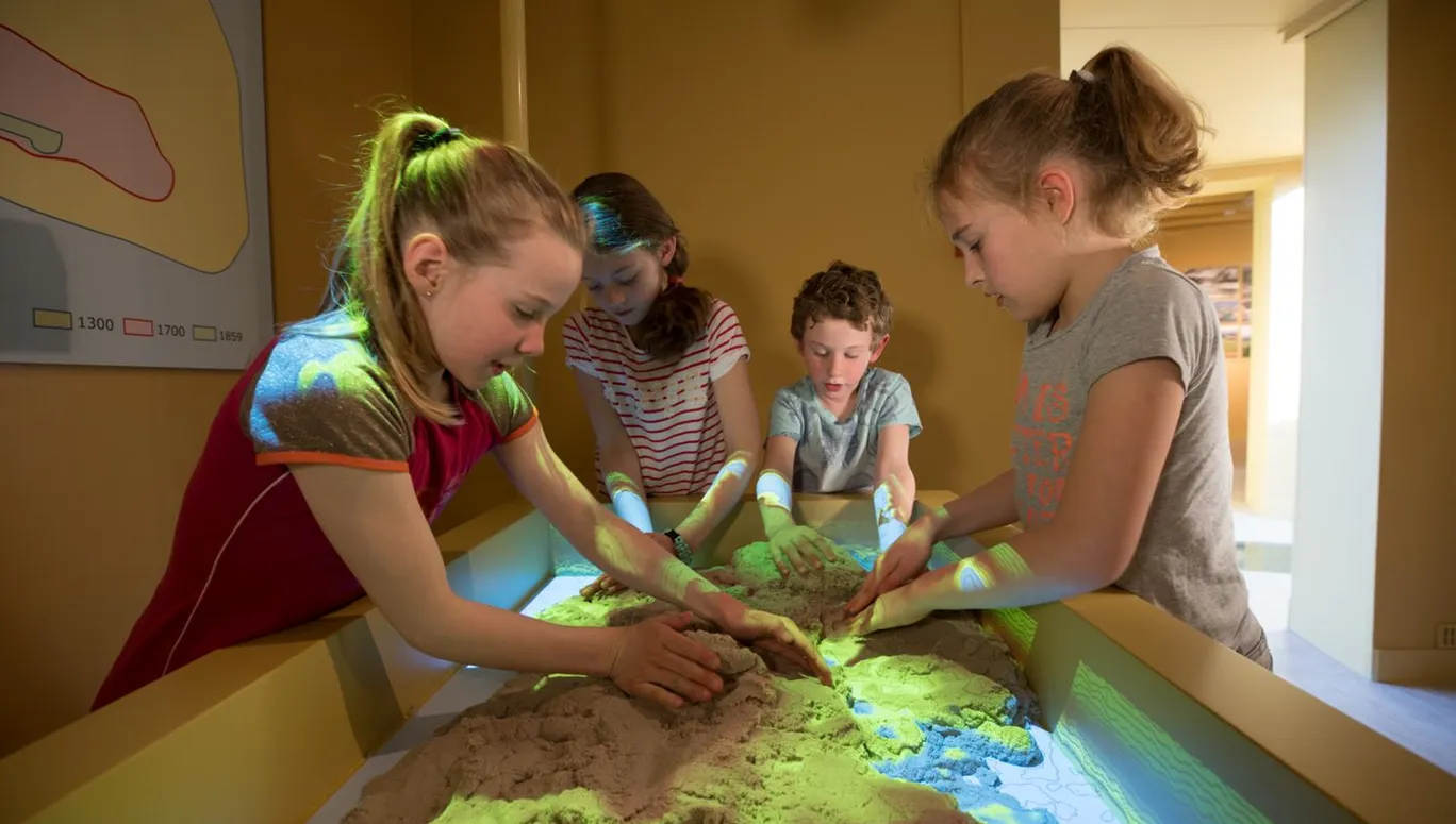 Kids playing with exhibit at Museum Schokland