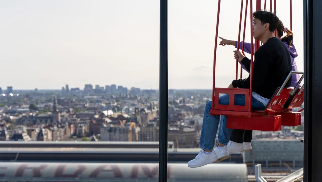 People on the  / ADAM Lookout / swings