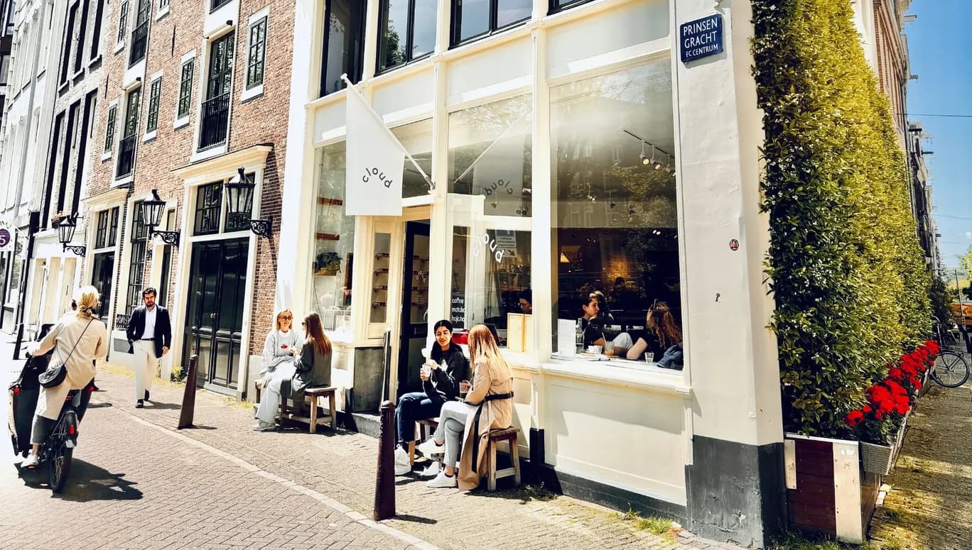 Cloud Gallery people sitting in front outside in the sun