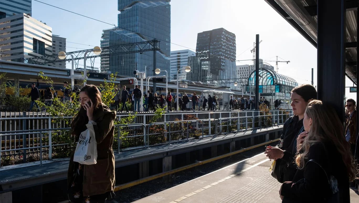 2AE4KGB Young office workers at the business hub Amsterdam South (Zuidas) in Amsterdam, Netherlands, close to Schiphol Airport.
