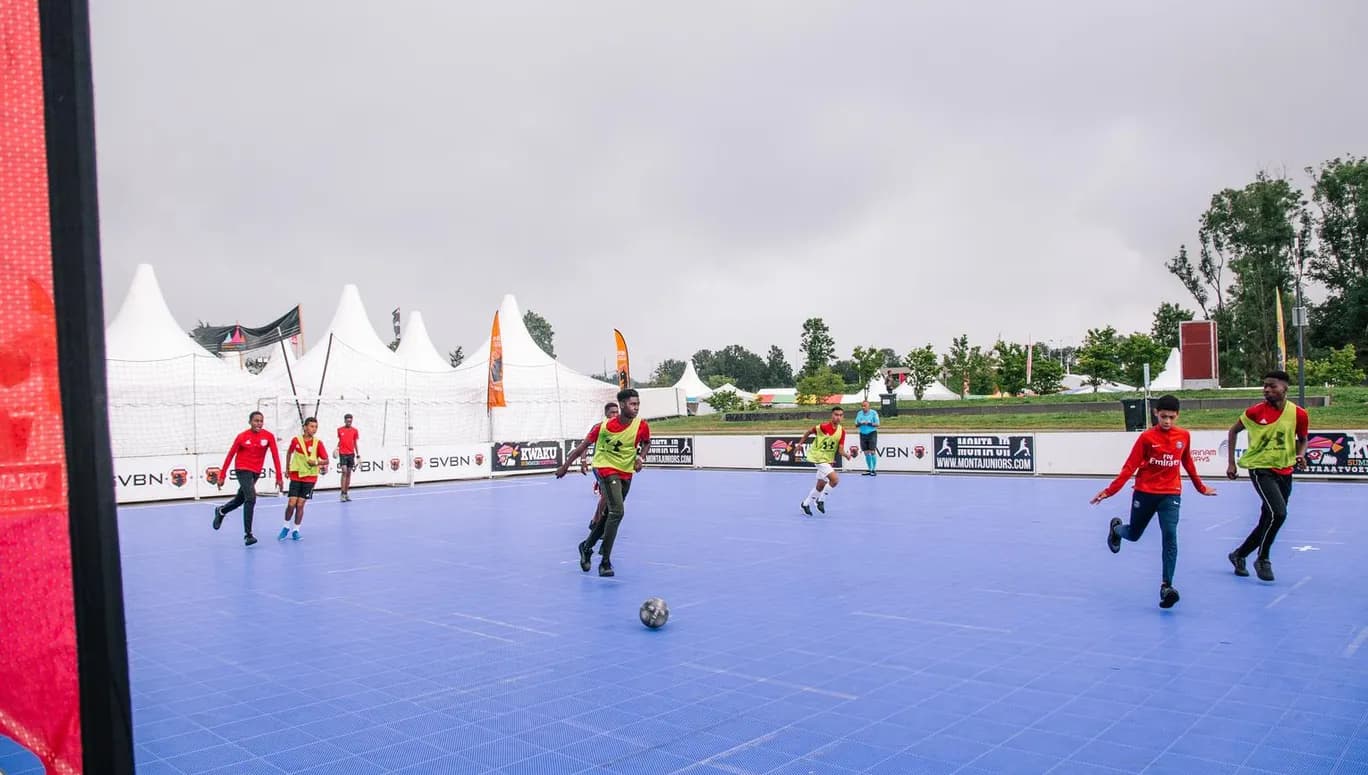Kids playing football at Kwaku festival Nelson Mandela Park