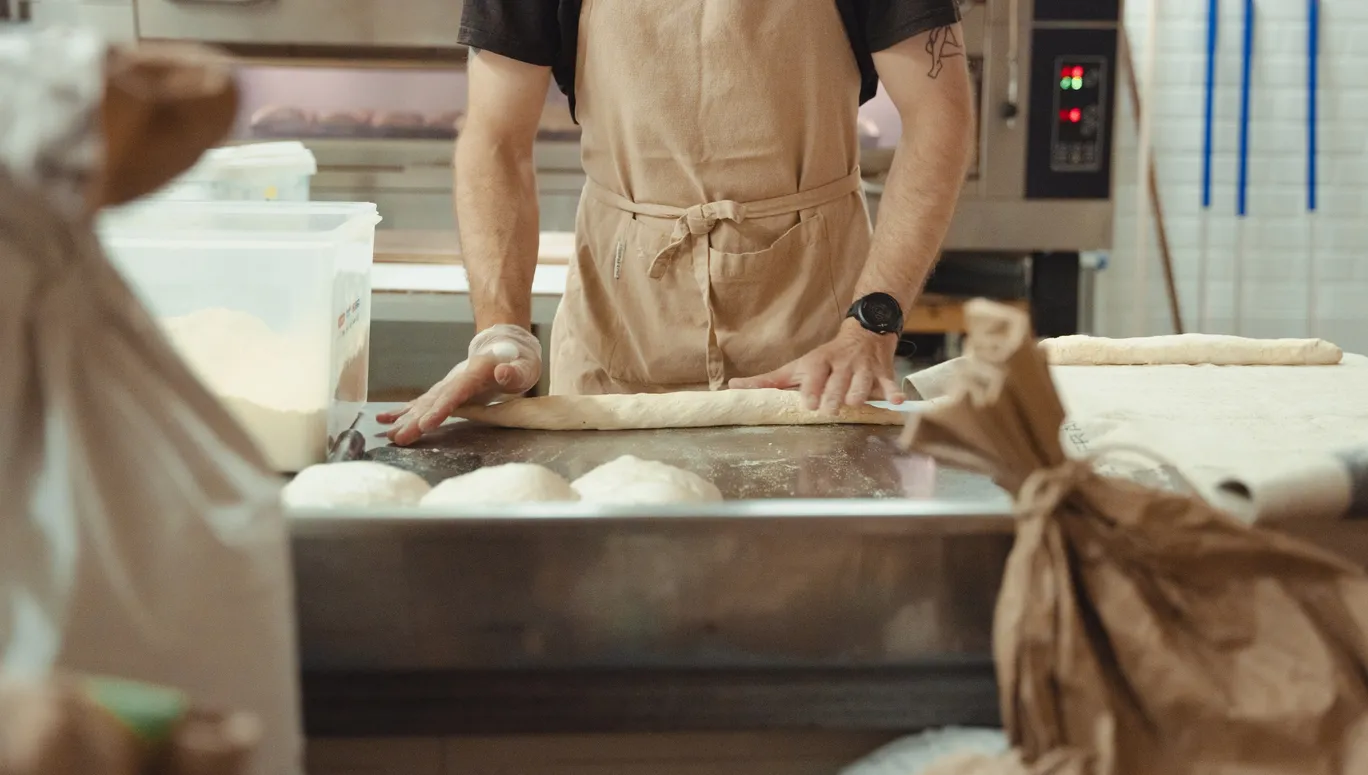 Ulmus bakery baker preparing the dough