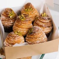 Pastries in a box at SAINT-JEAN bakery.