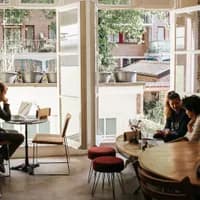 Lova people sitting inside at the windows