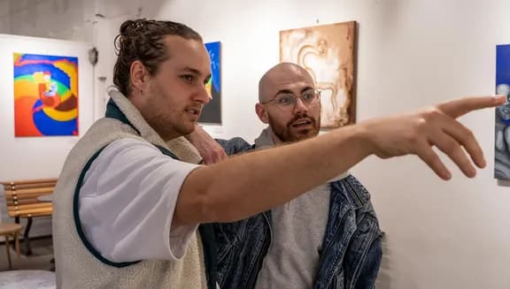 A couple visits OSCAM - Open Space Contemporary Art Museum.