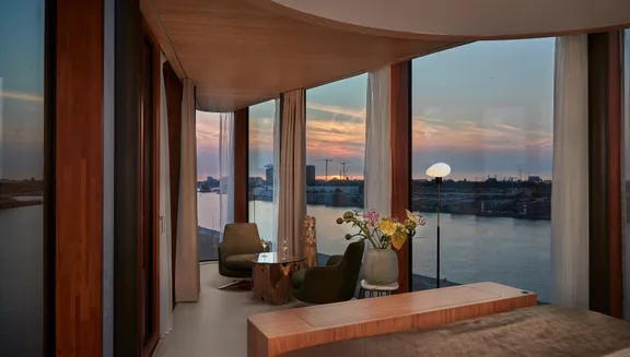 Hotel Jakarta Junior Suite interior and view on 't IJ