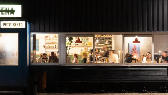 FC Hyena cinema restaurant exterior at night