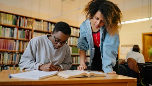 Pexels stock photo with two school children teens