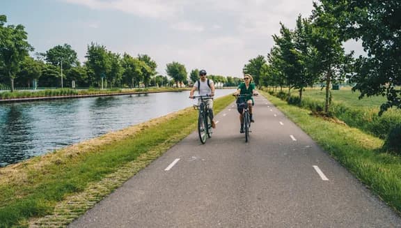Man and woman cycling in the countryside