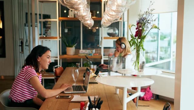 Zoku people working on their laptops