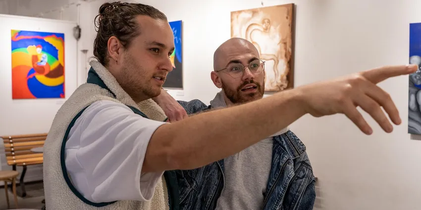 A couple visits OSCAM - Open Space Contemporary Art Museum.