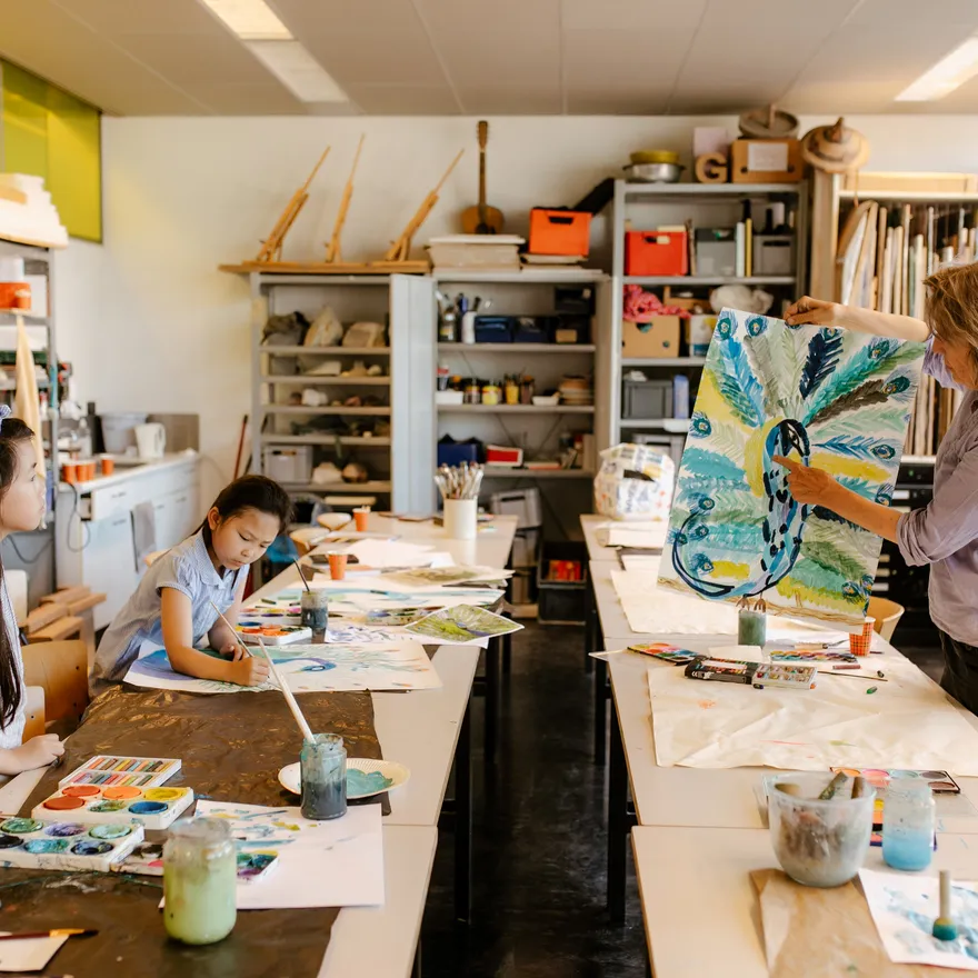 Kids painting at Platform C