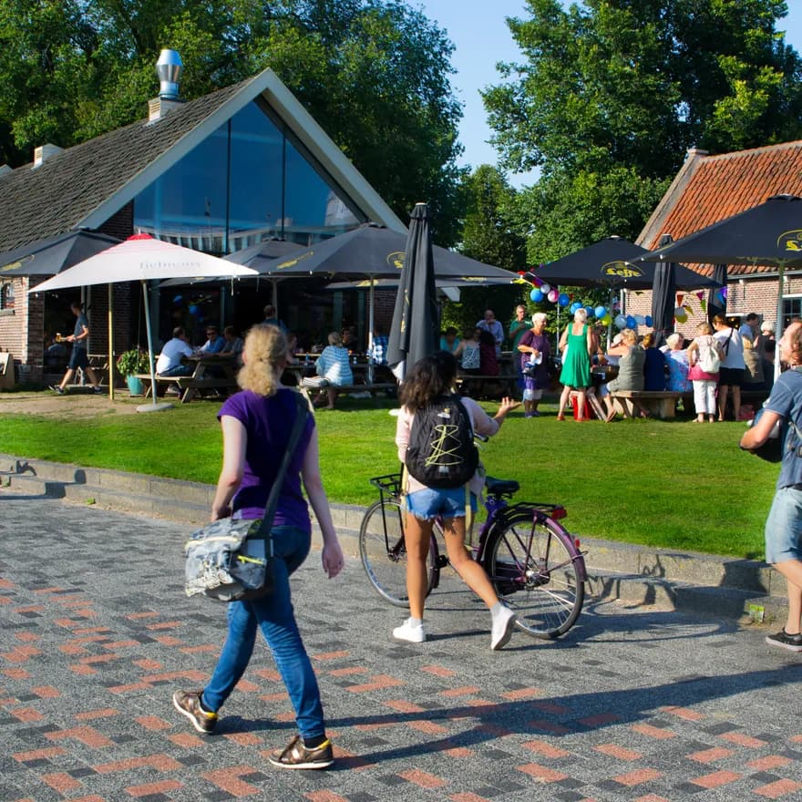 People outside cafe Polder