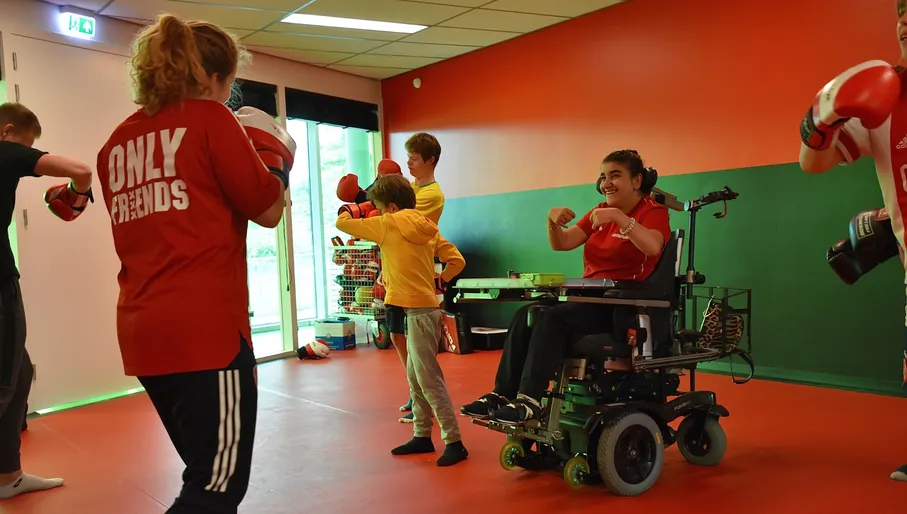 Only Friends disabled people practicing kickbox