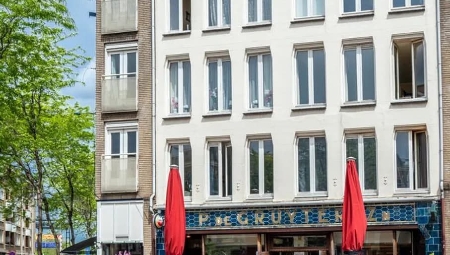 People sitting on terrace outside Piet de Gruyter