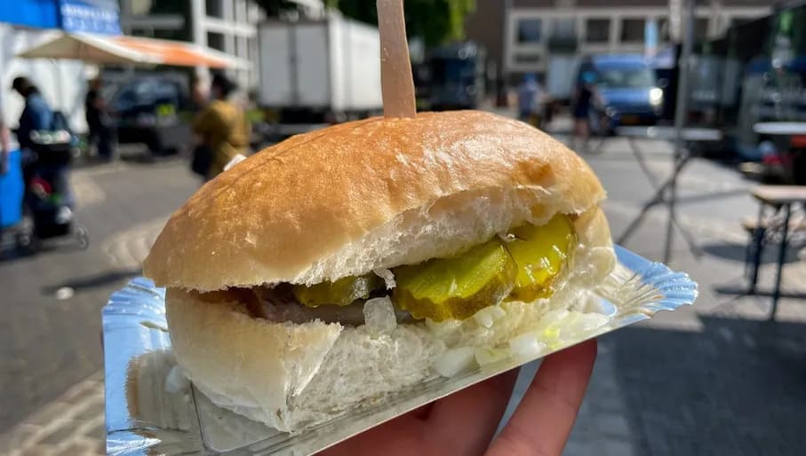 Traditional street food in Holland bun with herring, pickled cucumbers and onions in a hand close up on saturday farmers market in Arnhem
2182764091
Typically Dutch foods
