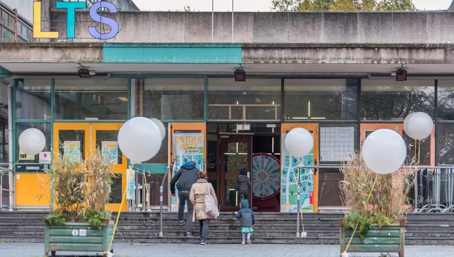 People going into the LTS building