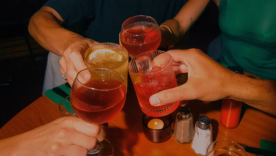 Stacks Diner people toasting with drinks