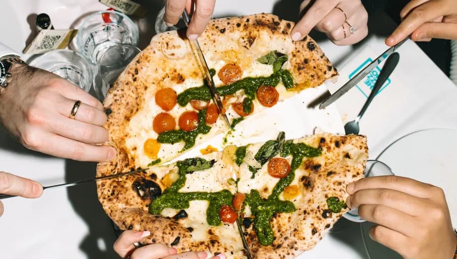 Pizza Beppe restaurant people having pizza