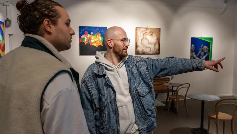 A couple visits OSCAM - Open Space Contemporary Art Museum.