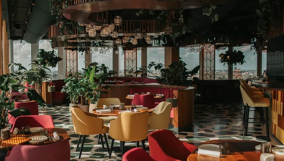 Interior of Selva cocktail bar and sky lounge at the nhow Amsterdam RAI hotel with views over Zuidas and Amsterdam Zuid