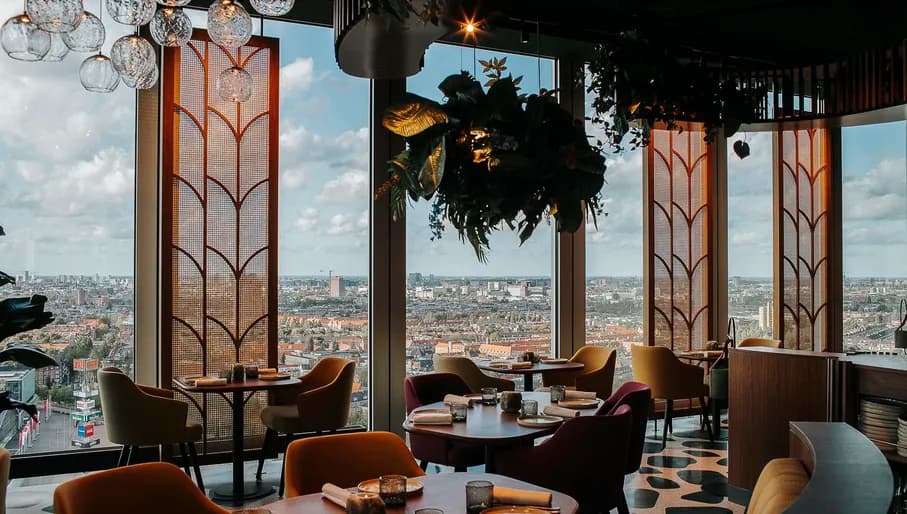 Interior of Selva cocktail bar and sky lounge at the nhow Amsterdam RAI hotel with views over Zuidas and Amsterdam Zuid