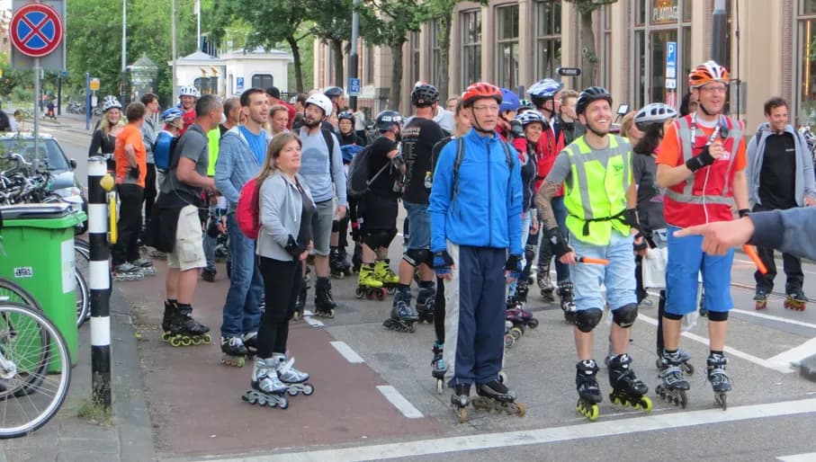 Friday Night Skate people skating past Artis
