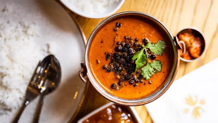 Spicy curry and rice dish at The Madras Diaries Indian restaurant