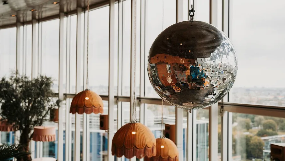 Disco ball interiors at Hasta la Vista, Baby Spanish rooftop skybar restaurant in Zuidas