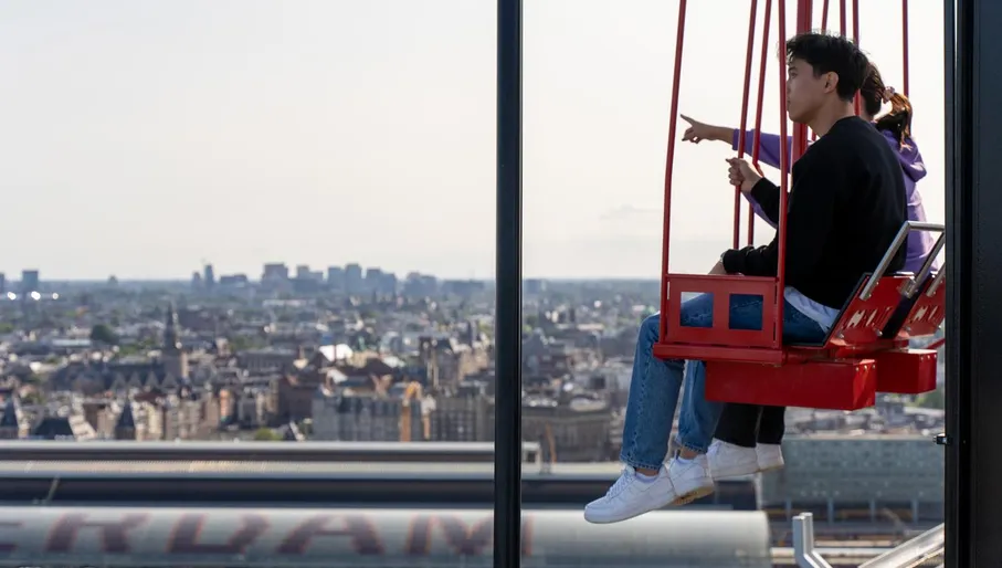 People on the  / ADAM Lookout / swings