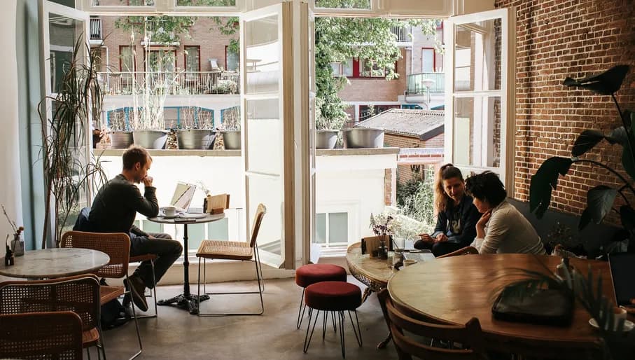 Lova people sitting inside at the windows