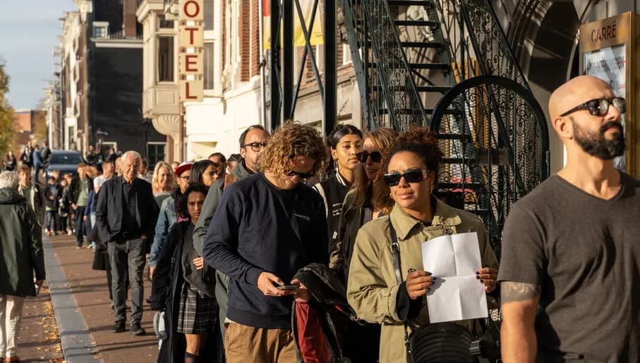 People in line for Koninklijk Theater Carré during Amsterdam Dance Event (ADE) 2022.