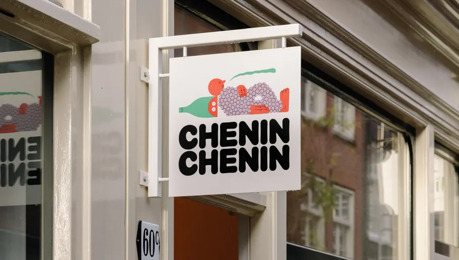 Chenin Chenin exterior logo of the wineshop by day