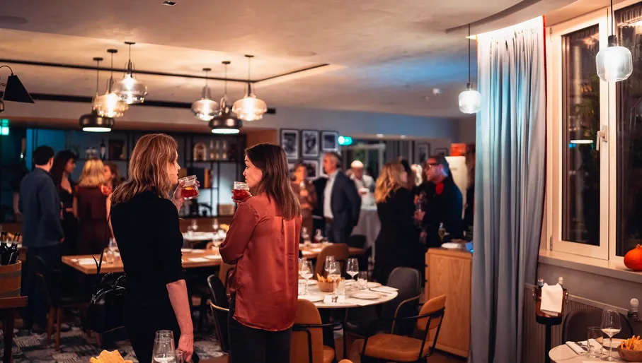 Group of diners at Tozi restaurant