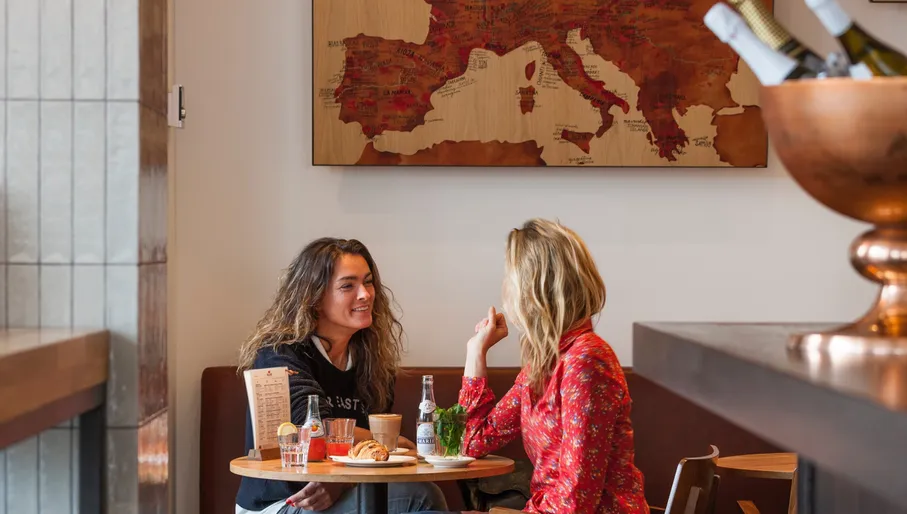 Blend Coffee & Wine two women sitting at a table