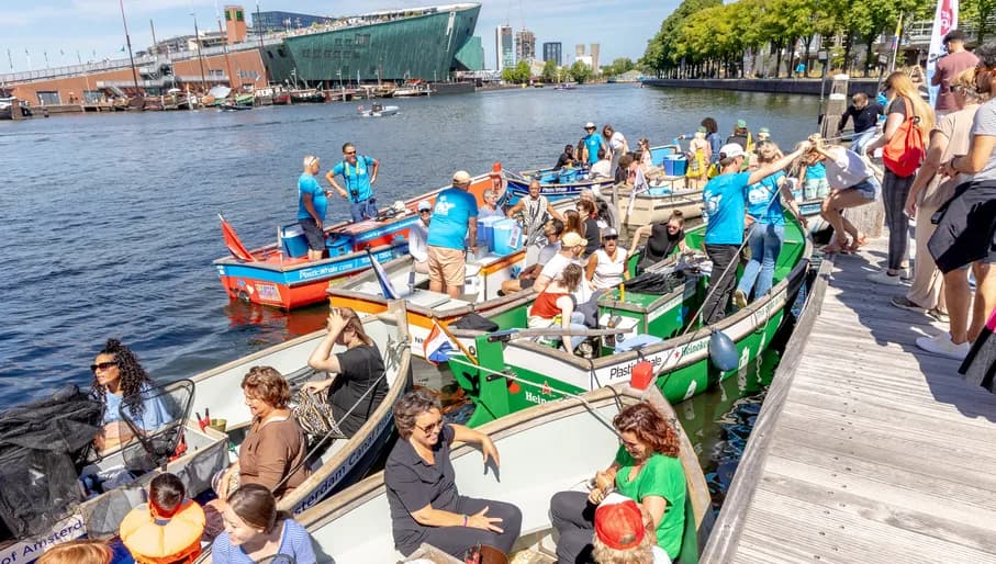 Plastic Whale boat with volunteers