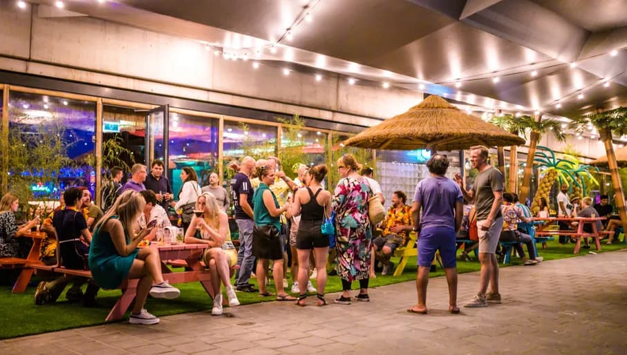 Aloha game center, people standing outside