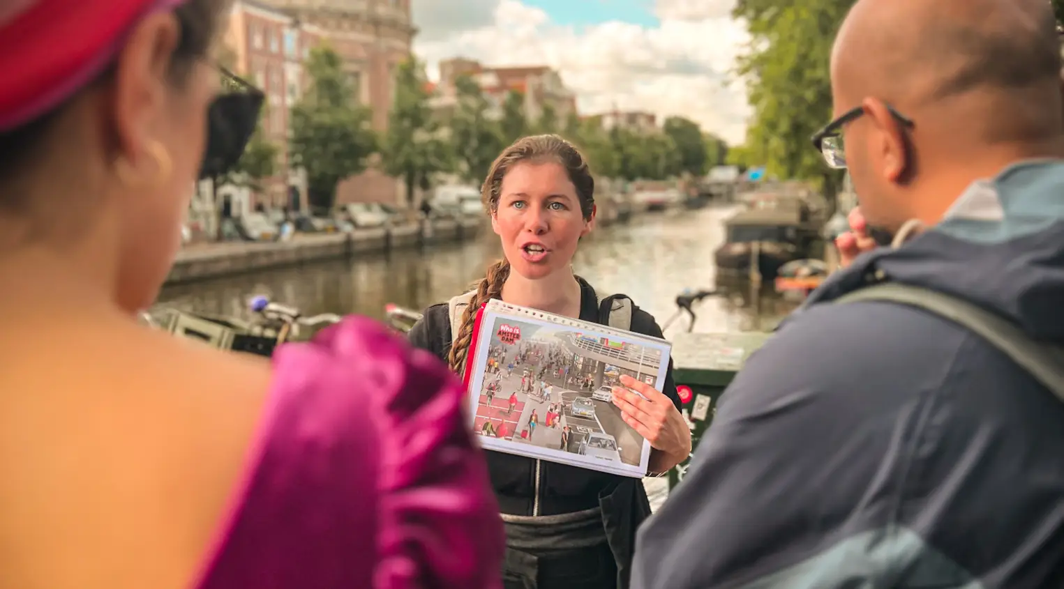 Who Is amsterdam Tours Guide explaining bike culture - Hello Amsterdam Walking tour