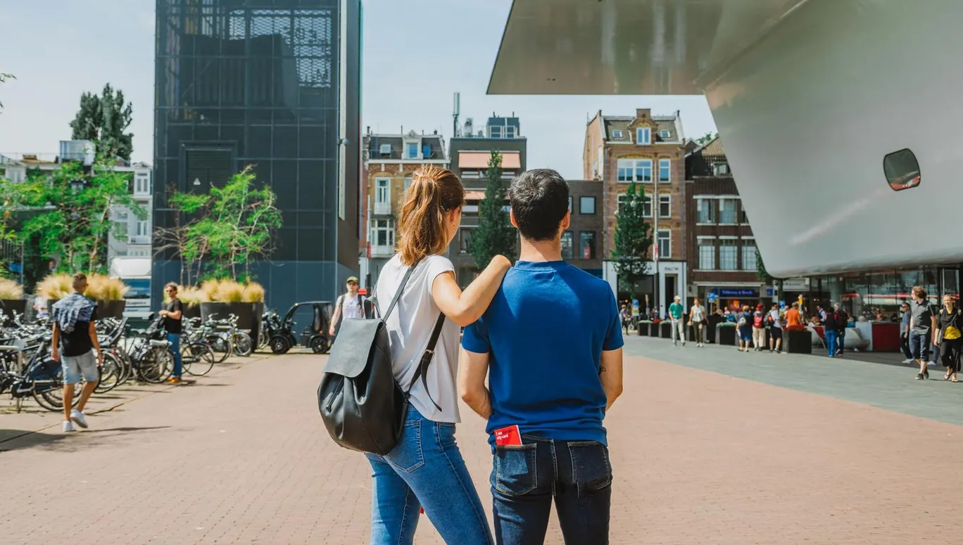 A couple at the Museumplein Stedelijk Museum