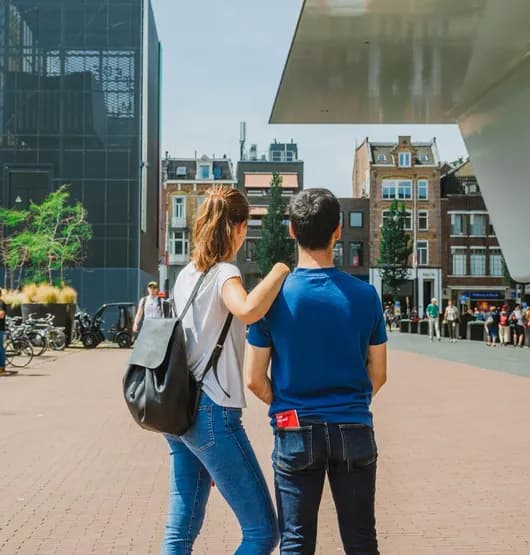 A couple at the Museumplein Stedelijk Museum