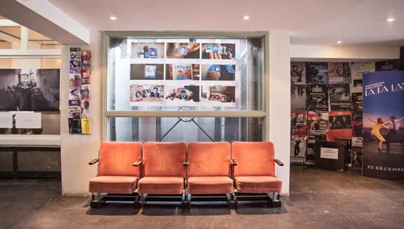 Bench Movie Theater Kriterion cinema cafe interior